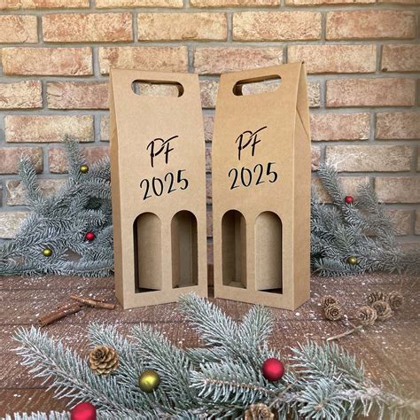 Dve fľaše micelárnych šampónov Nivea - jedna ružová a jedna tyrkysová.