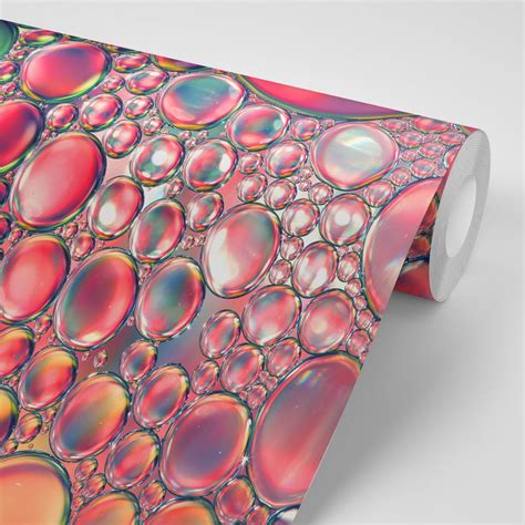 dizajnér: ilustrácia zobrazujúca kvapky odličovacieho oleja dopadajúce na vatový tampón